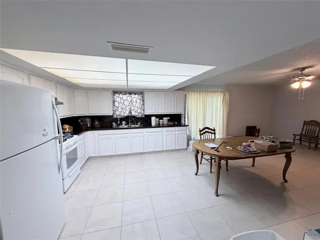a kitchen with a cabinets and counter space