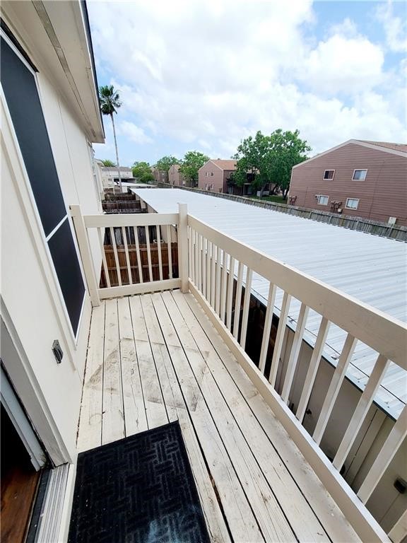 6702 Everhart Road Corpus Christi, TX 78413 - Photo 11 of 14 a view of balcony with wooden floor