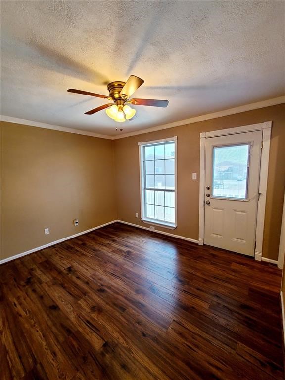 6702 Everhart Road Corpus Christi, TX 78413 - Photo 7 of 14 a view of an empty room with a window and wooden floor