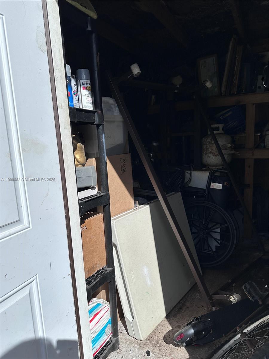 16215 Southwest 139th Court Miami, FL 33177 - Photo 21 of 31 a picture of water heater room