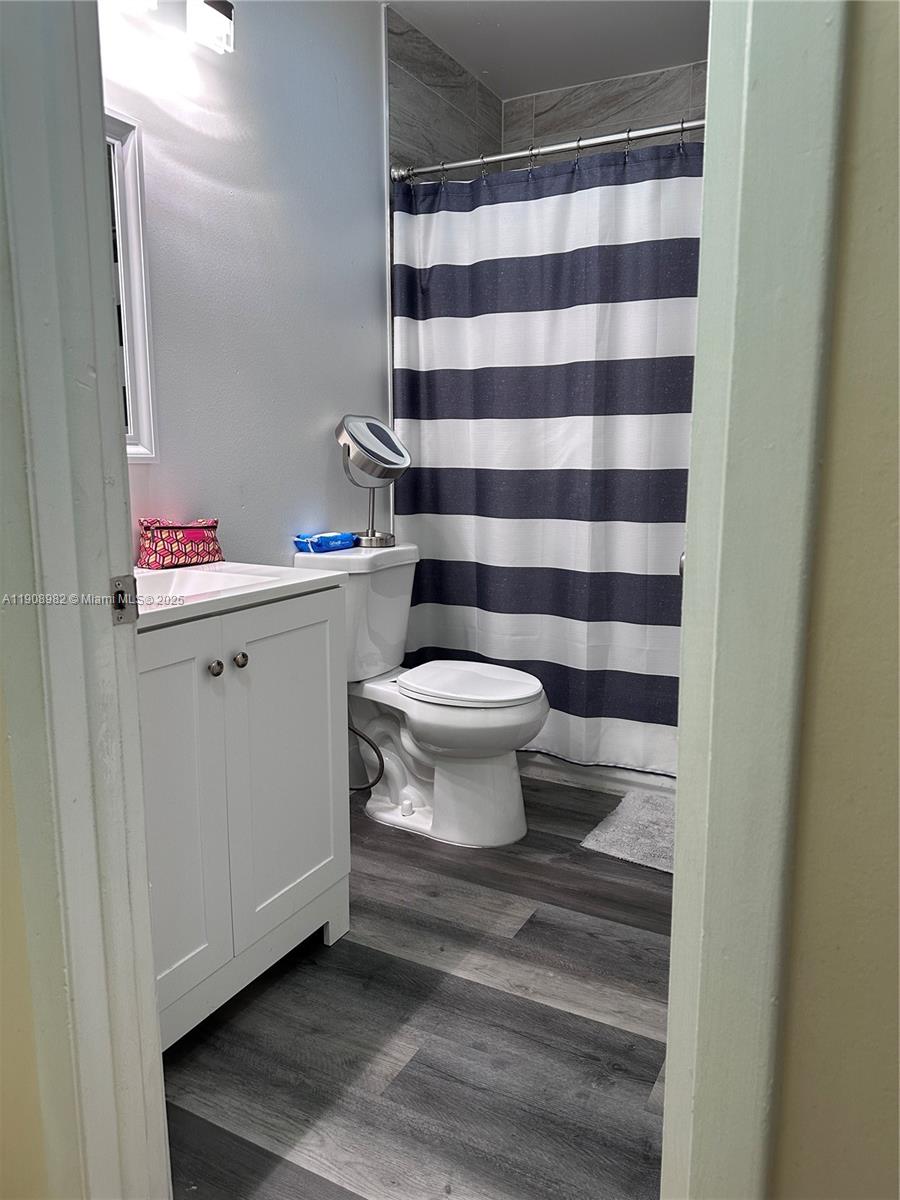 16215 Southwest 139th Court Miami, FL 33177 - Photo 29 of 31 a bathroom with a sink toilet and shower