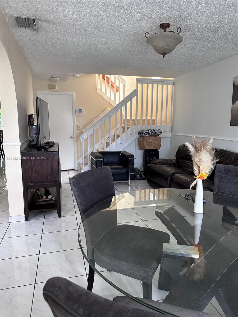 16215 Southwest 139th Court Miami, FL 33177 - Photo 7 of 31 a living room with furniture and a wooden floor
