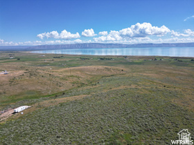 214 Bishop Road, Unit 33 Fish Haven, ID 83287 - Photo 15 of 23 Expansive undeveloped land featuring natural terrain and distant water body
