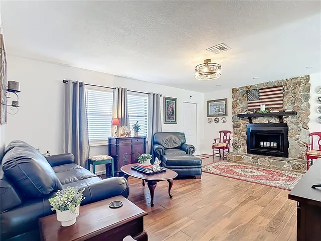 a kitchen with granite countertop cabinets stainless steel appliances and sink