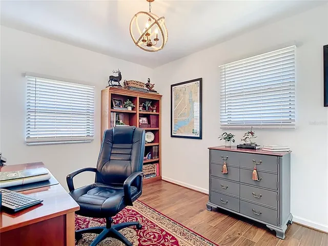 a bathroom with a toilet a sink and a mirror