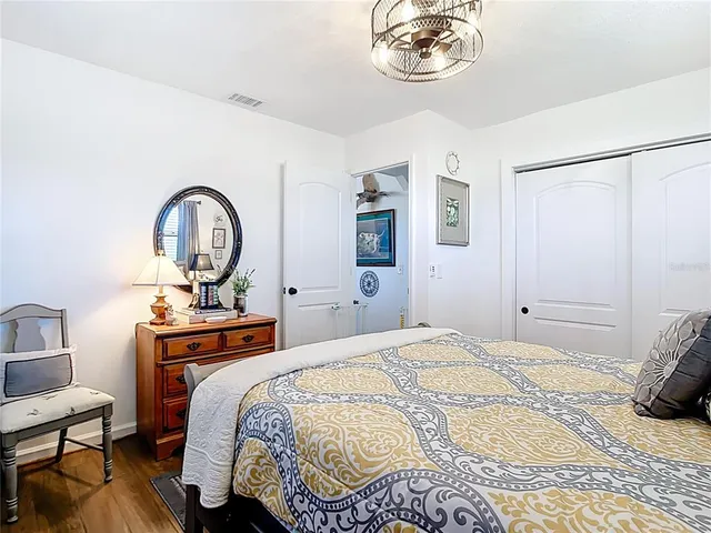 a view of a swimming pool with a porch