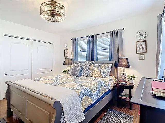a view of a hallway with paintings on the wall