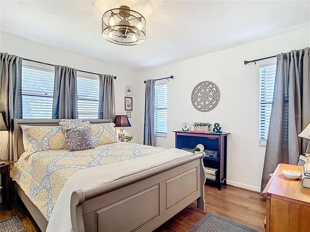 a view of a house with backyard yard and swimming pool