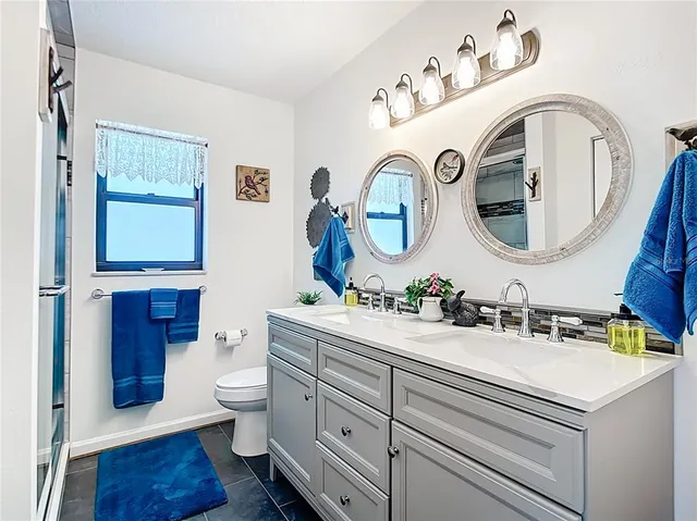 a front view of house with yard and seating space