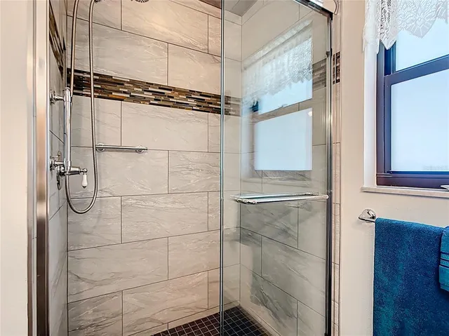 an aerial view of a city and lake view