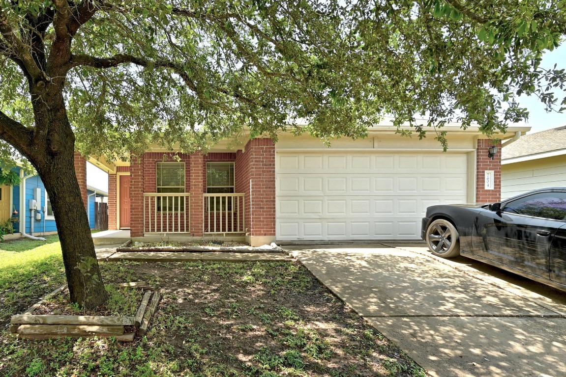 7604 Cayenne Lane Austin, TX 78741 - Photo 1 of 1 a front view of a house with yard