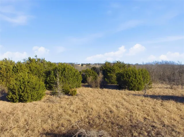 a view of mountain with sunset