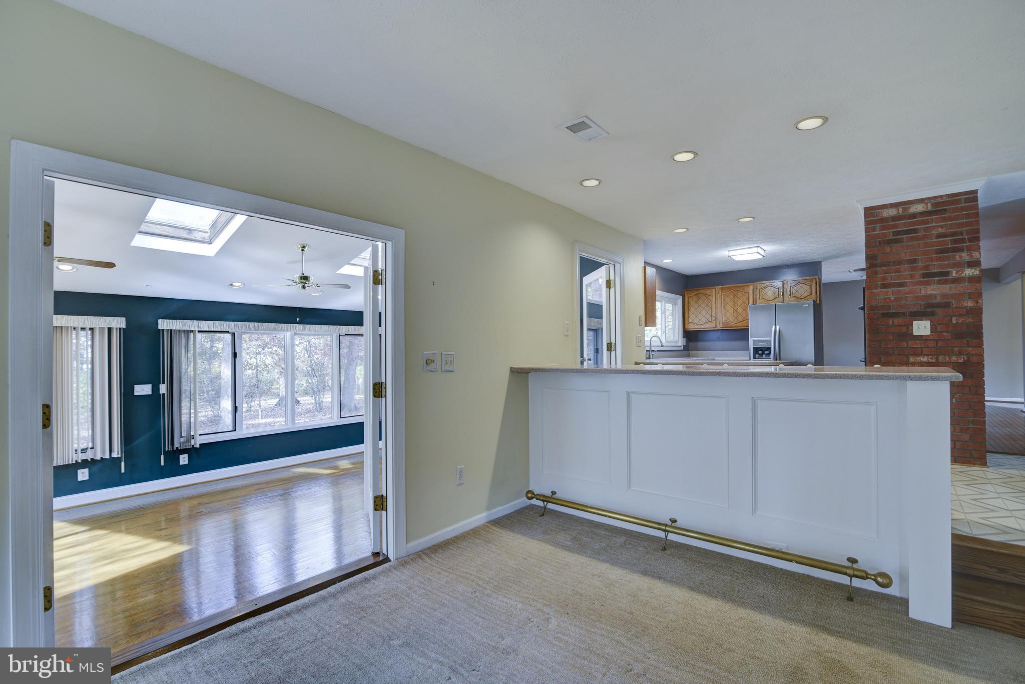 49 Carrollton Road Sterling, VA 20165 - Photo 27 of 61 Family room w/ entry to sunroom