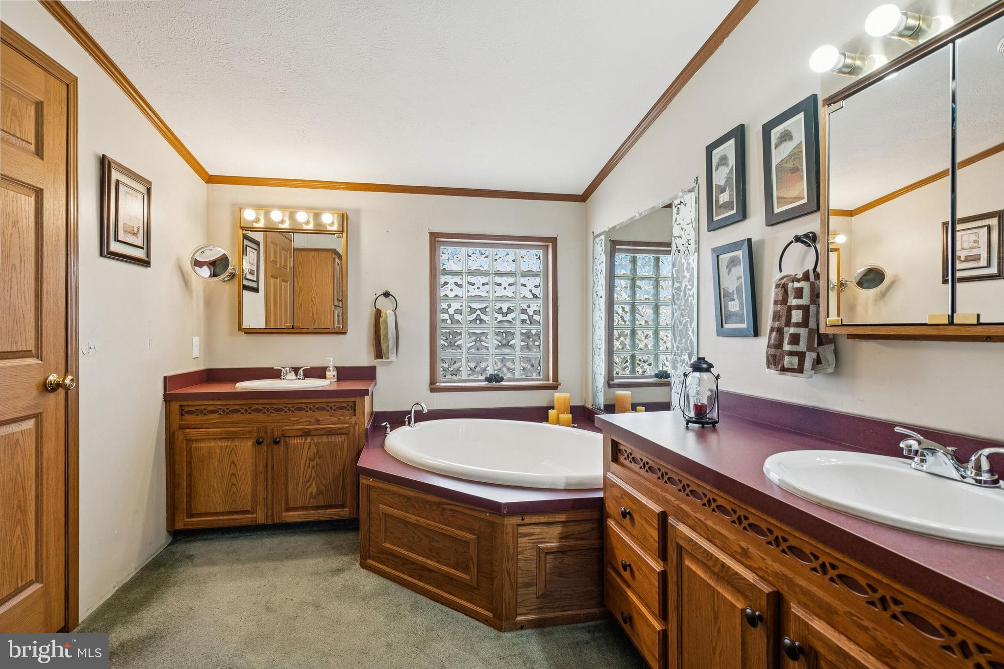 133 Spring Garden Street Woodstown, NJ 08098 - Photo 18 of 50 a bathroom with a granite countertop tub sink and mirror