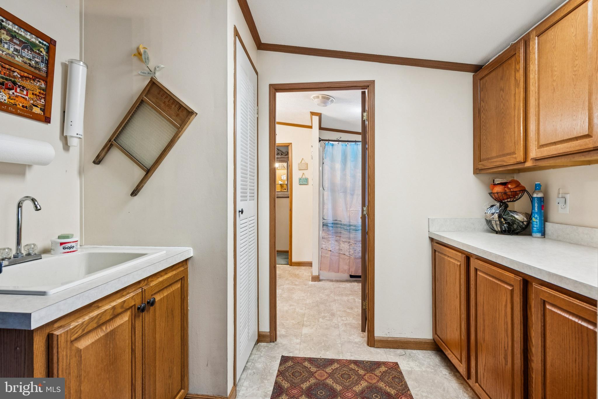 133 Spring Garden Street Woodstown, NJ 08098 - Photo 23 of 50 a bathroom with a sink and a mirror