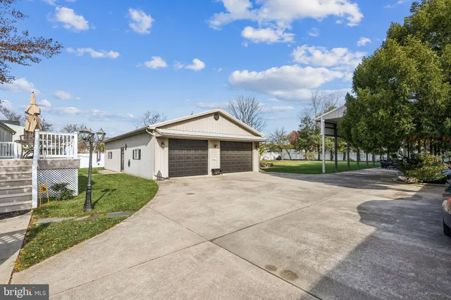 a view of an empty room with stairs