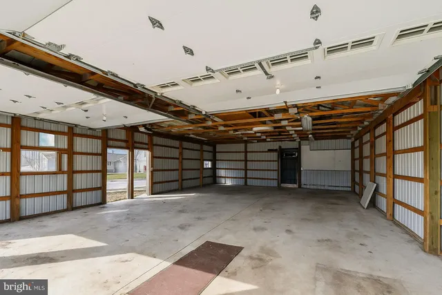 a view of a backyard with sitting area