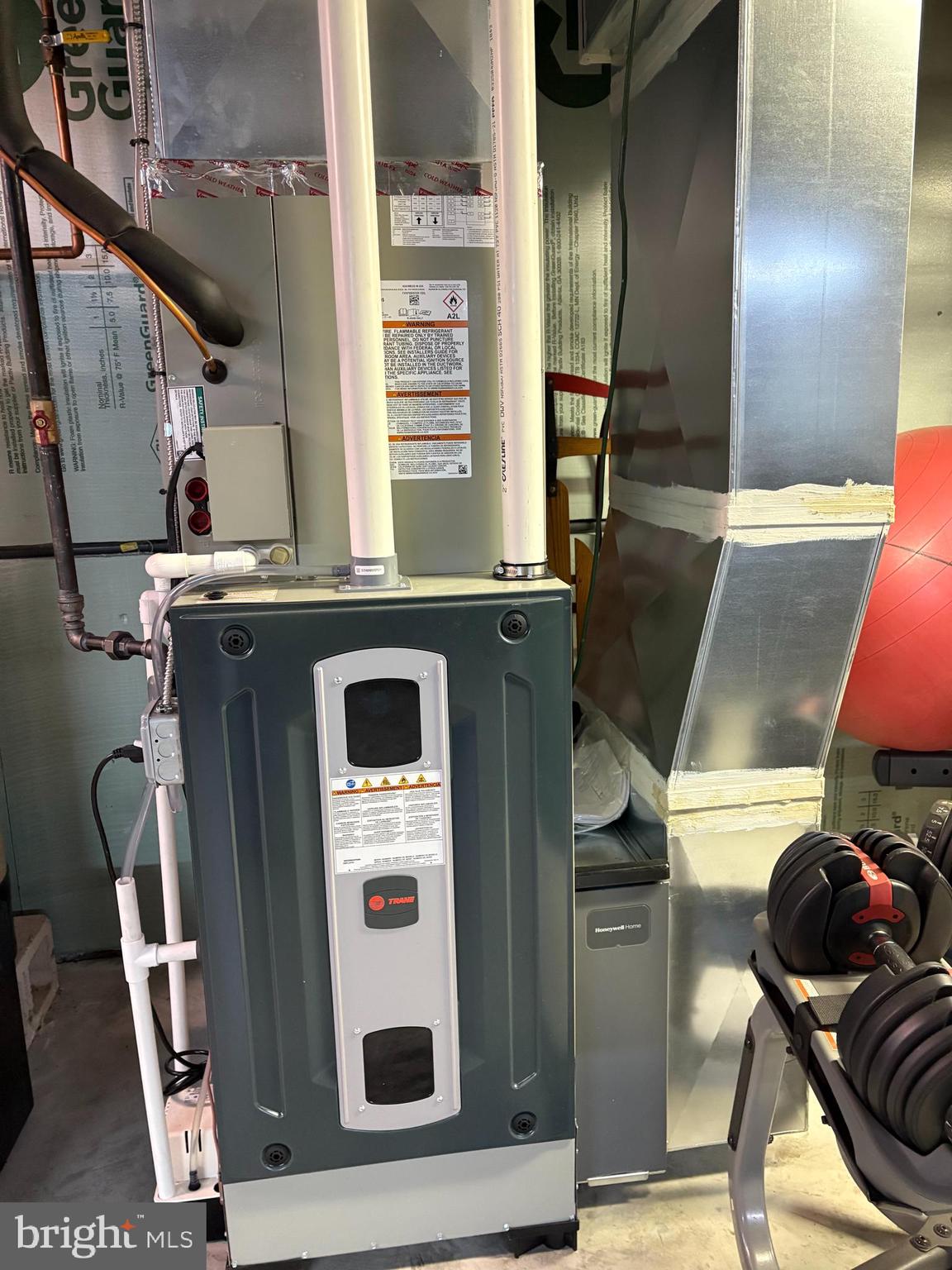 133 Spring Garden Street Woodstown, NJ 08098 - Photo 29 of 50 a view of a kitchen with stainless steel appliances wooden floor and chair