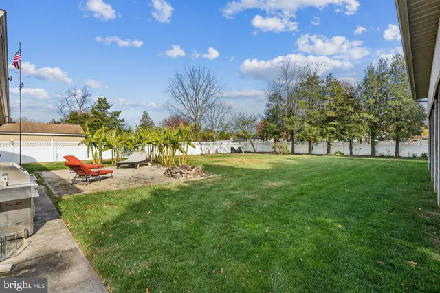 a view of a house with a big yard