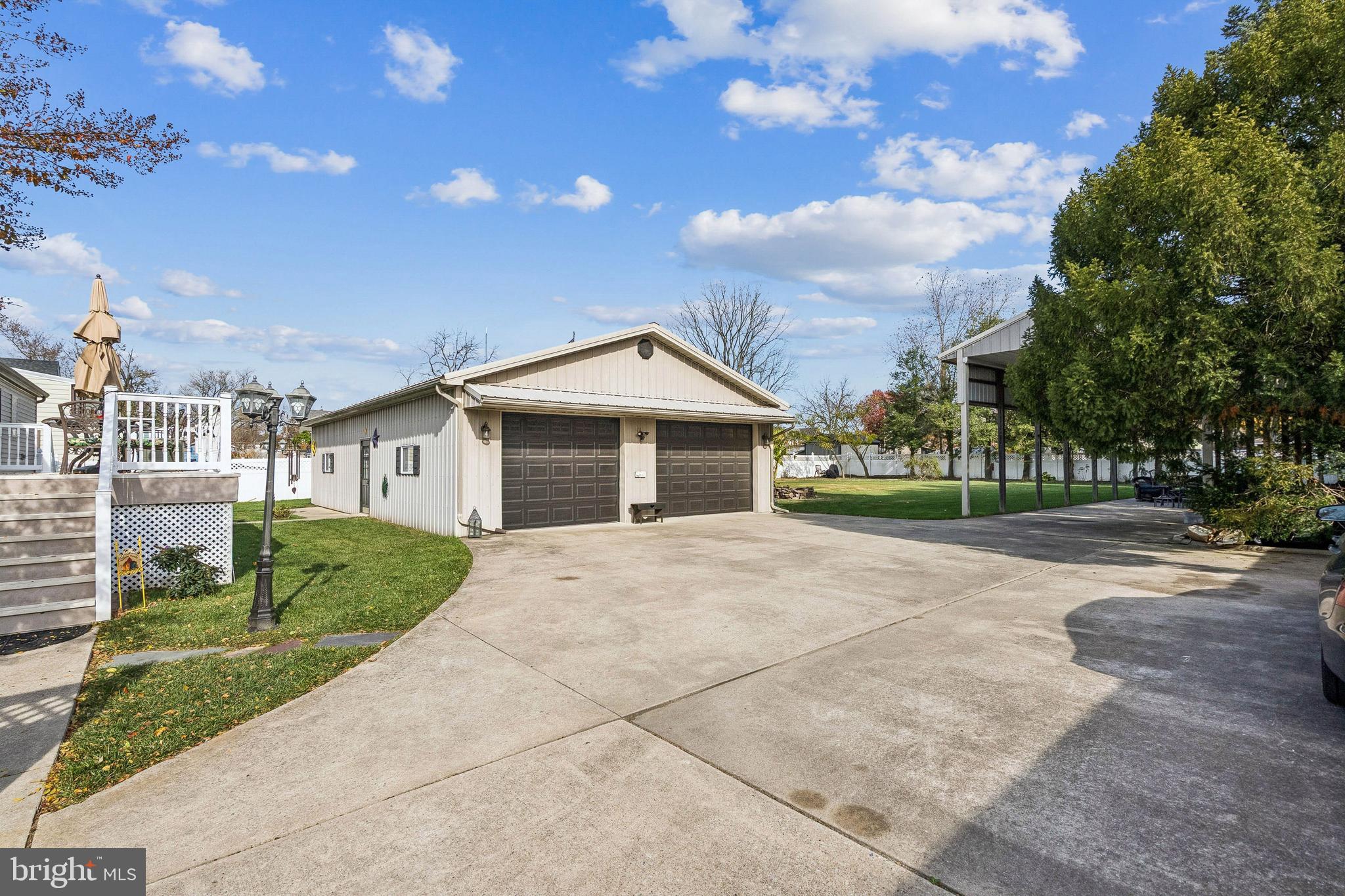 133 Spring Garden Street Woodstown, NJ 08098 - Photo 34 of 50 a view of a house with a yard and large tree