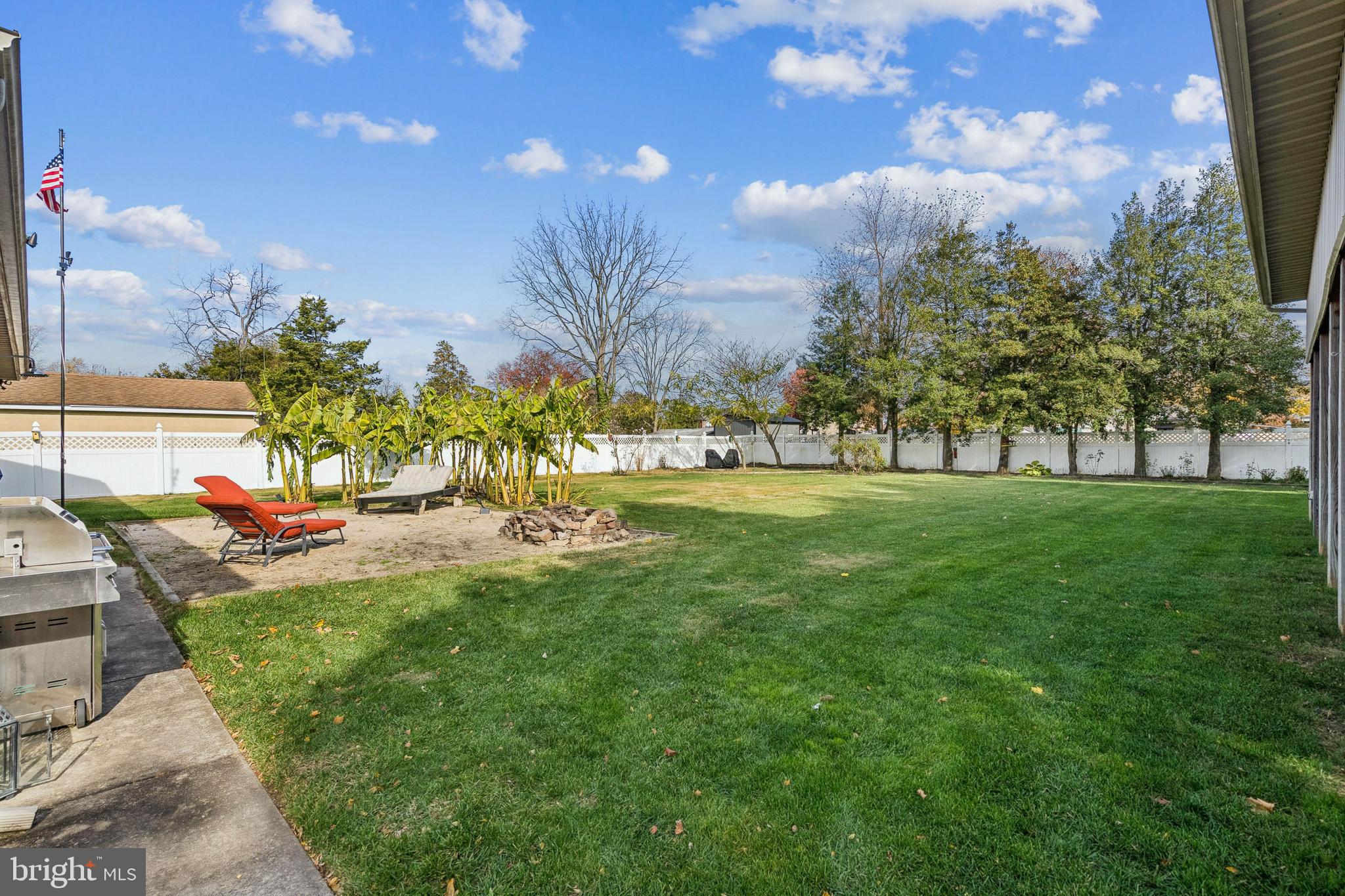 133 Spring Garden Street Woodstown, NJ 08098 - Photo 38 of 50 a view of a backyard with sitting area
