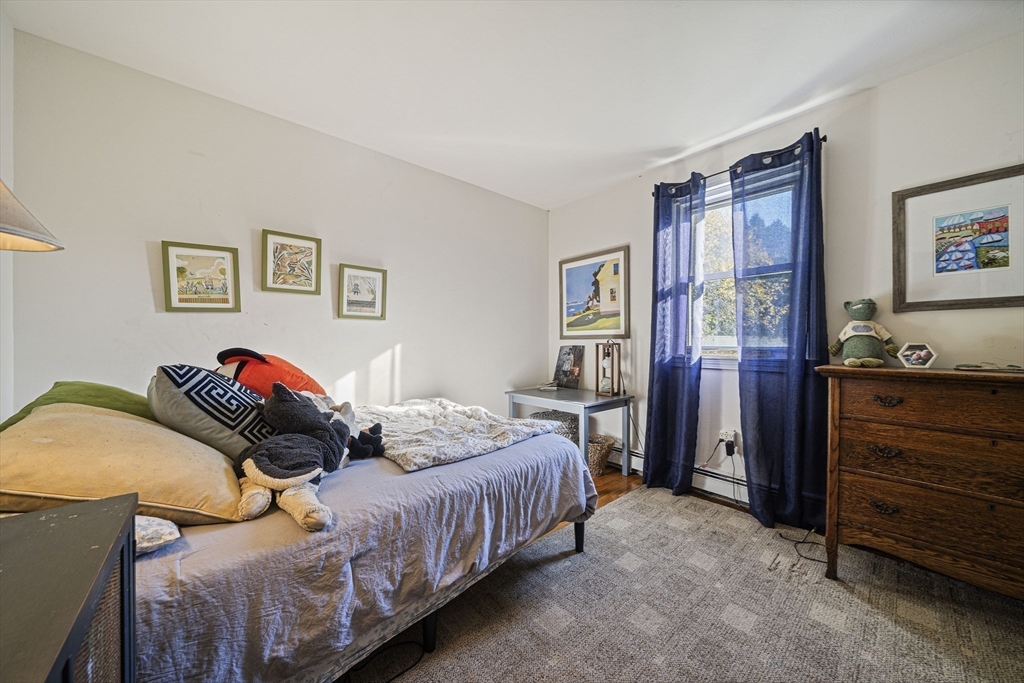 417 Hatherly Road Scituate, MA 02066 - Photo 12 of 25 a bedroom with bed and a closet