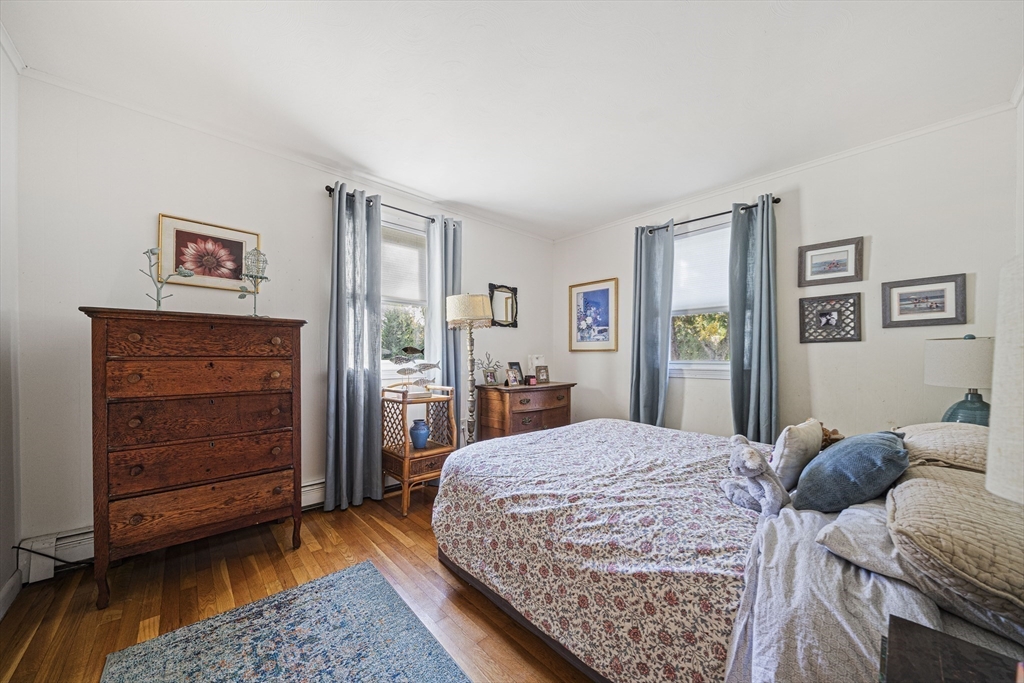 417 Hatherly Road Scituate, MA 02066 - Photo 13 of 25 a bedroom with a bed and dresser