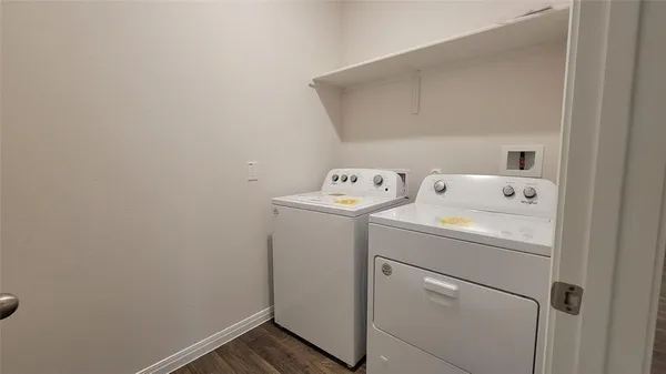 a view of a bathroom from a hallway