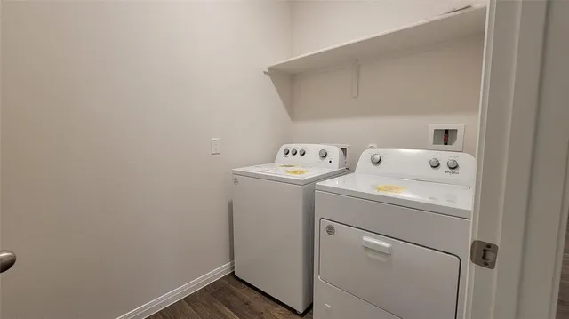 a view of a bathroom from a hallway