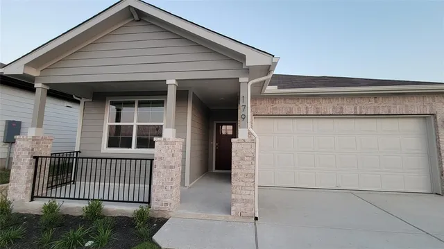 a view of a house with a porch