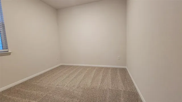 a view of a hallway with entryway