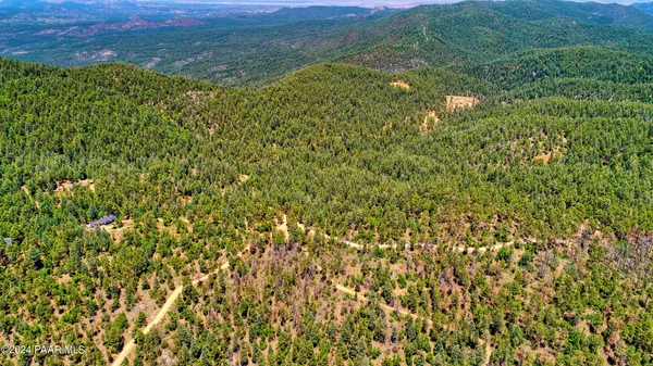 a view of a field with an outdoor space
