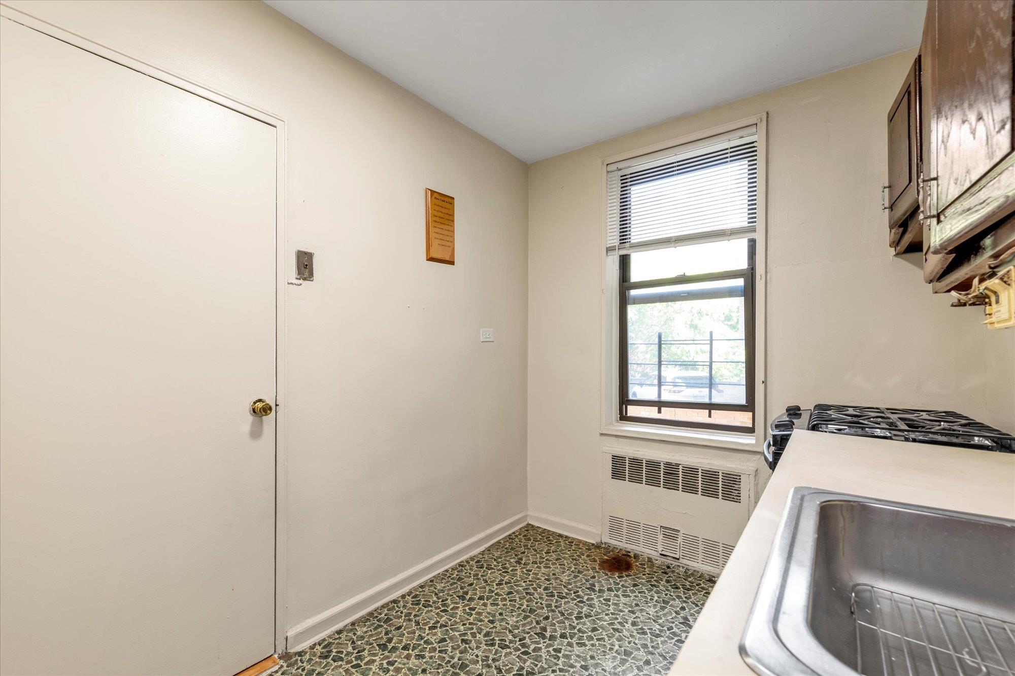 141-05 Pershing Crescent, Unit 117 Queens, NY 11435 - Photo 8 of 16 a view of a storage & utility room