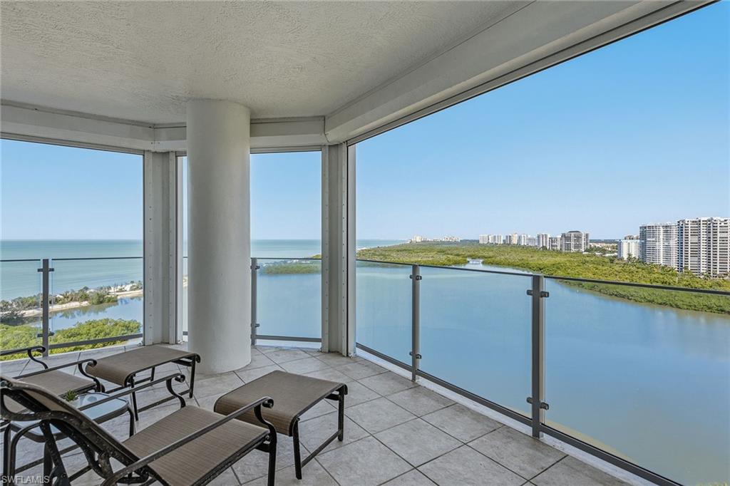 60 Seagate Drive, Unit 1606 Naples, FL 34103 - Photo 19 of 44 a view of swimming pool with seating space