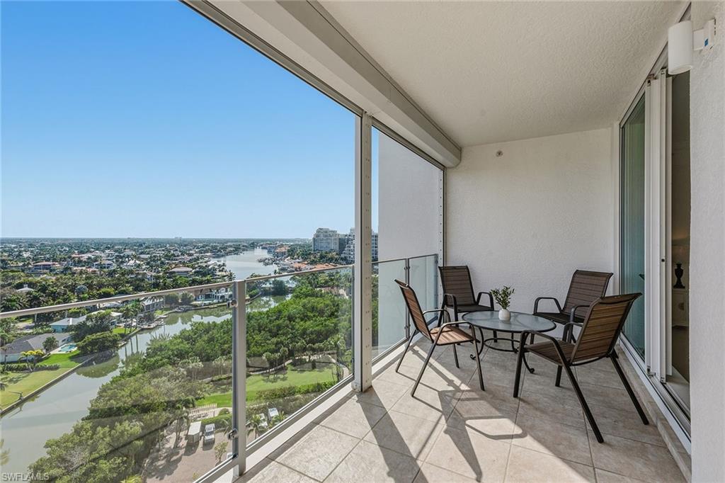 60 Seagate Drive, Unit 1606 Naples, FL 34103 - Photo 29 of 44 a view of a balcony with chairs
