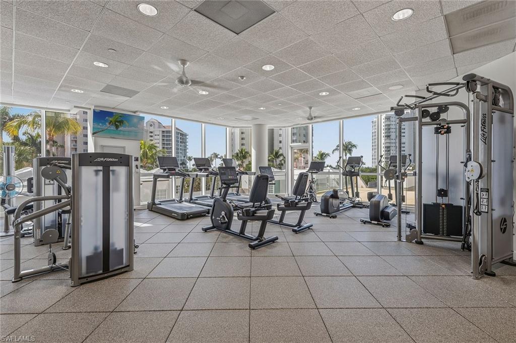 60 Seagate Drive, Unit 1606 Naples, FL 34103 - Photo 39 of 44 a view of a room with gym equipment