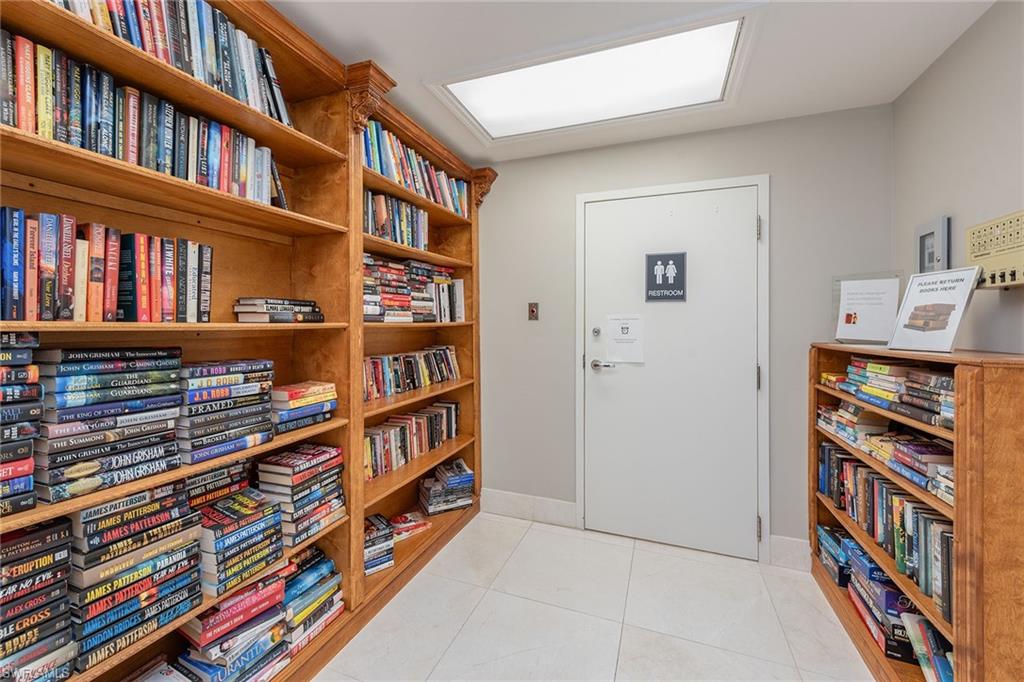 60 Seagate Drive, Unit 1606 Naples, FL 34103 - Photo 41 of 44 a view of an empty room with shelves