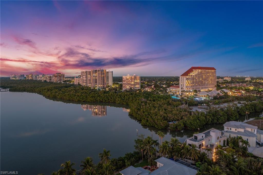 60 Seagate Drive, Unit 1606 Naples, FL 34103 - Photo 44 of 44 a view of a city with tall buildings