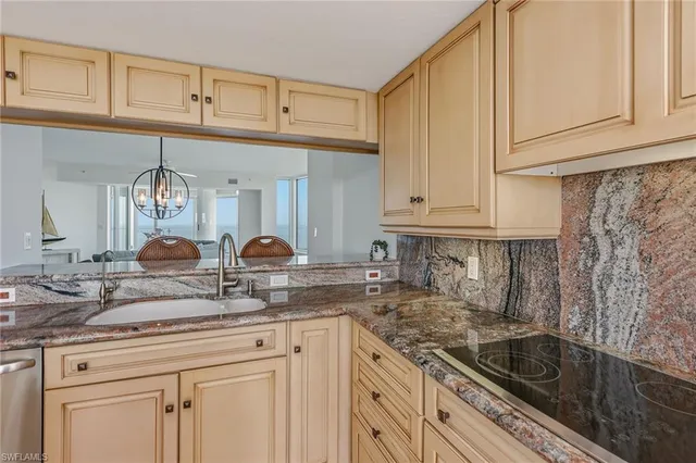 a view of a kitchen counter space and wooden floor
