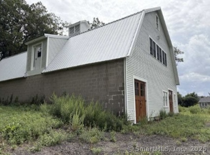 490 Old Day Hill Road Windsor, CT 06095 - Photo 6 of 11 a house view with a backyard space