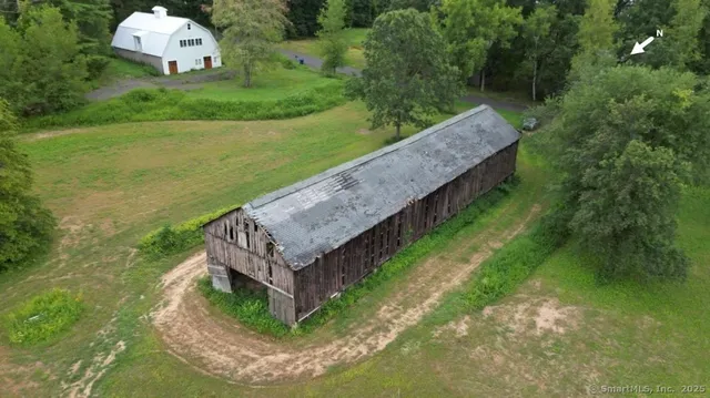 a view of a backyard with a fountain