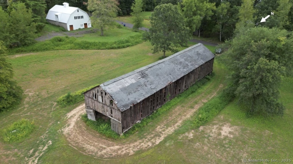 490 Old Day Hill Road Windsor, CT 06095 - Photo 9 of 11 a view of a backyard with a fountain