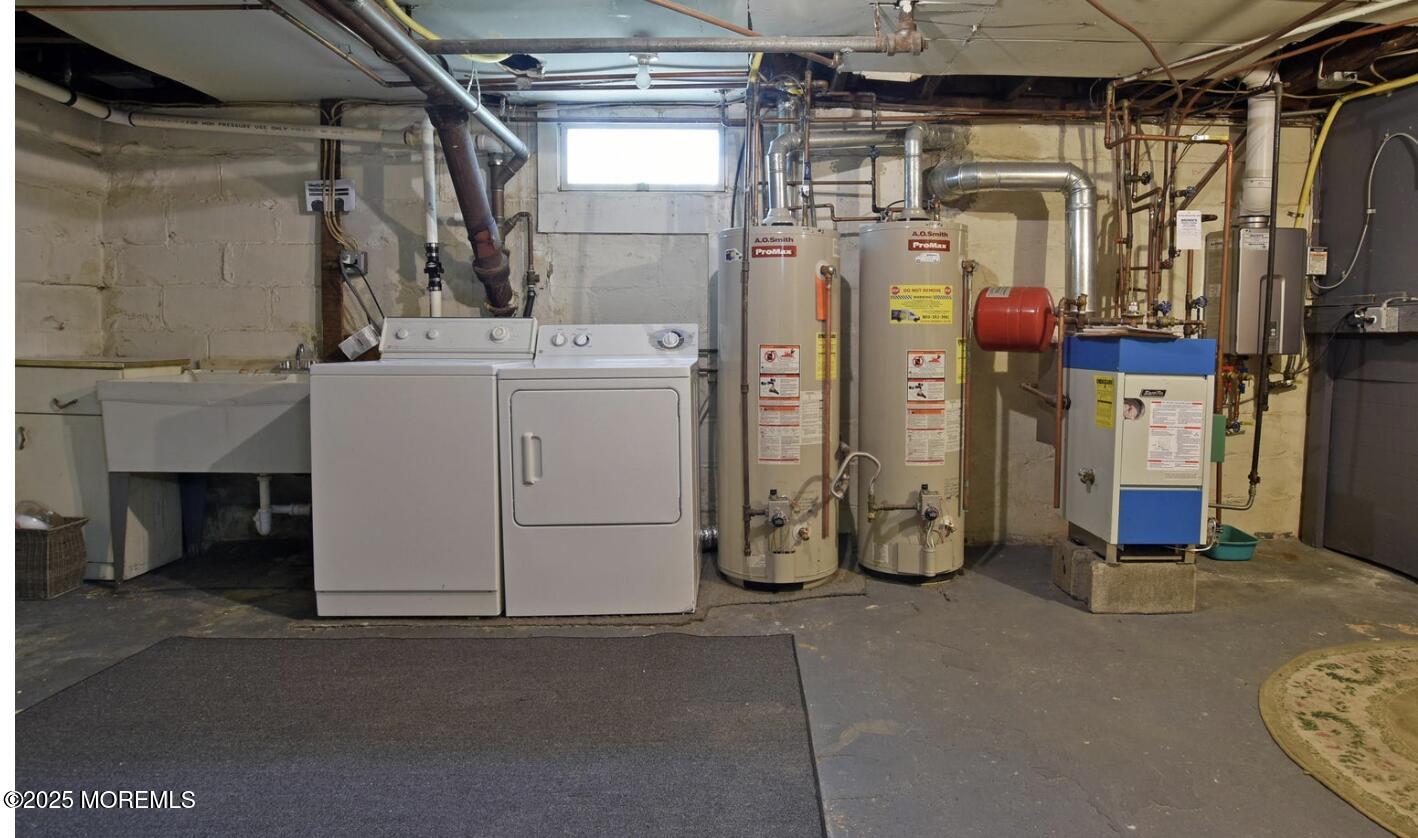 90 Pinckney Road, Unit B Red Bank, NJ 07701 - Photo 14 of 16 a utility room with dryer and washer