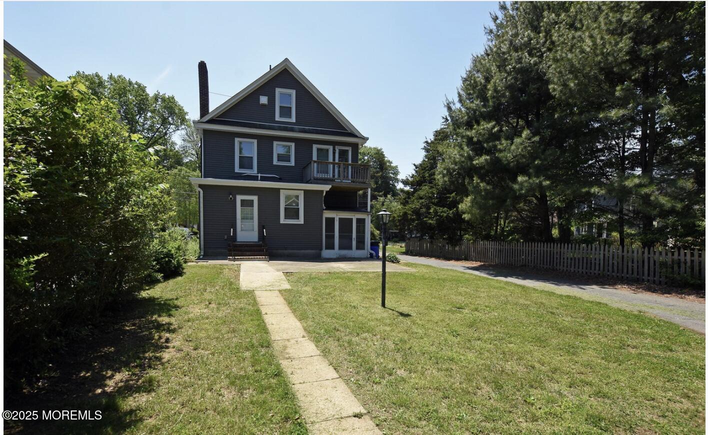 90 Pinckney Road, Unit B Red Bank, NJ 07701 - Photo 15 of 16 a front view of a house with a yard