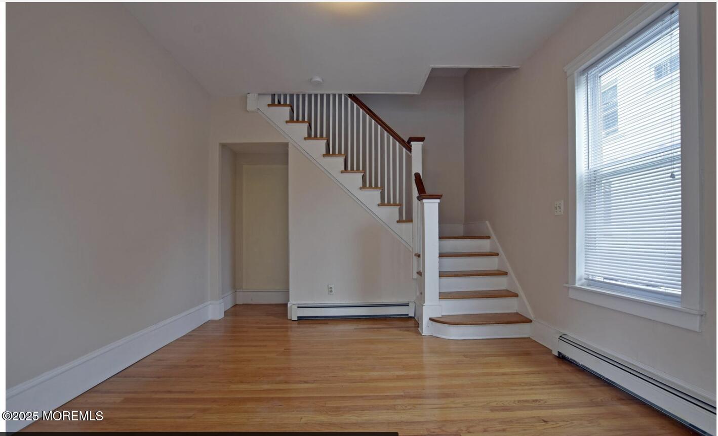 90 Pinckney Road, Unit B Red Bank, NJ 07701 - Photo 3 of 16 a view of entryway with wooden floor