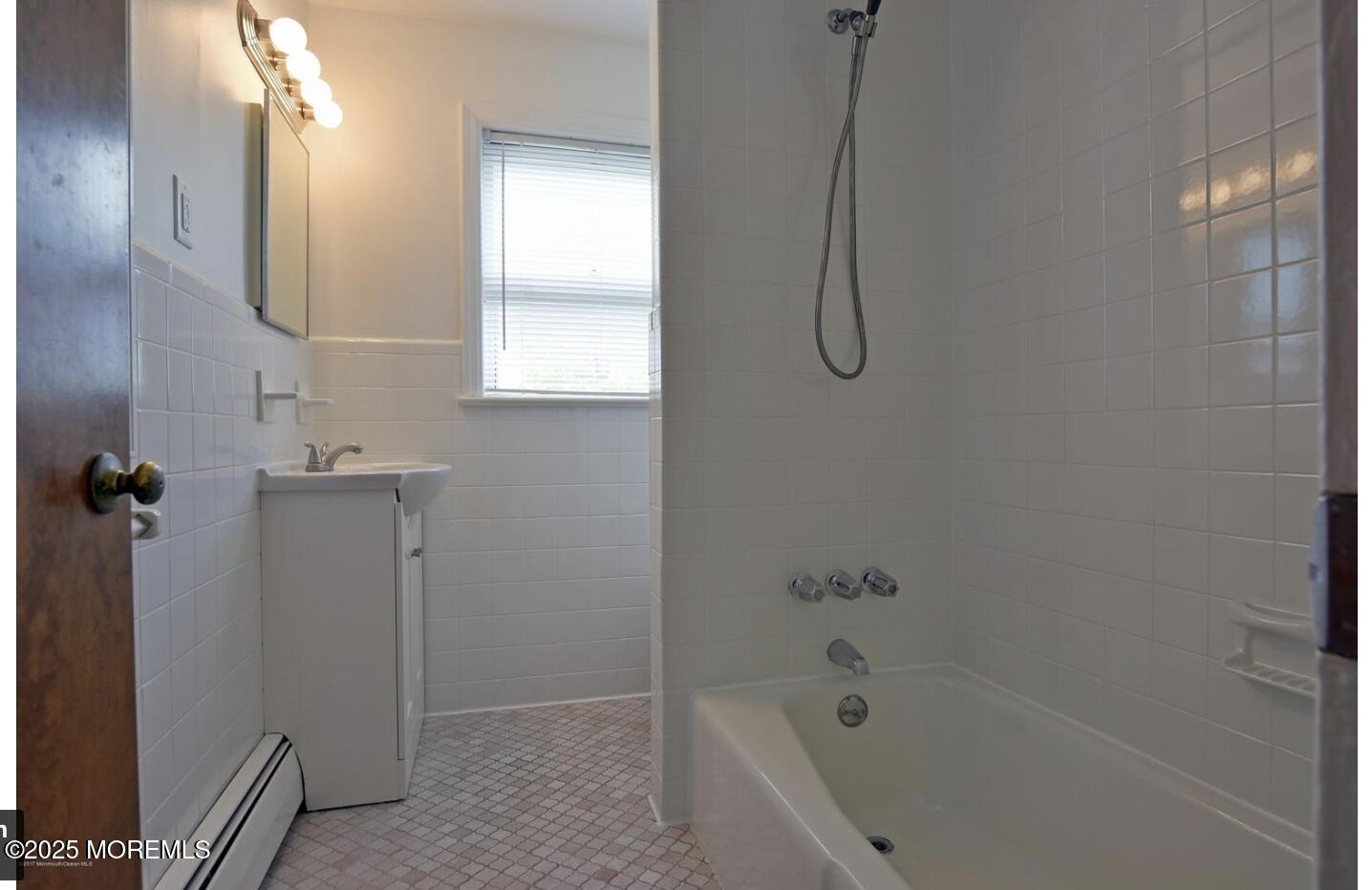 90 Pinckney Road, Unit B Red Bank, NJ 07701 - Photo 9 of 16 a bathroom with a bath tub