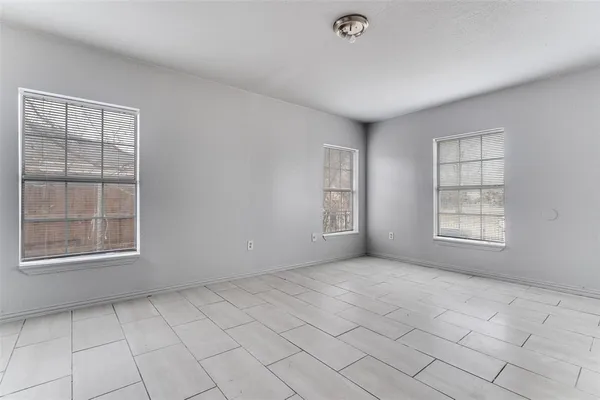 an empty room with windows