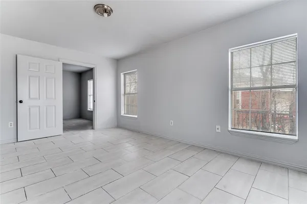 an empty room with windows