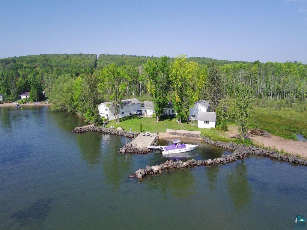 6431 Summit Avenue Washburn, WI 54891 - Photo 2 of 25 Drone / aerial view of a large body of water and a heavily wooded area
