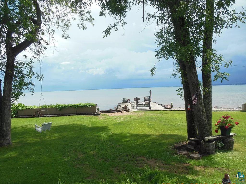 6431 Summit Avenue Washburn, WI 54891 - Photo 9 of 25 View of green lawn featuring a water view